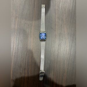 Vintage unique Y2K Armitron watch with blue watch face and silver band